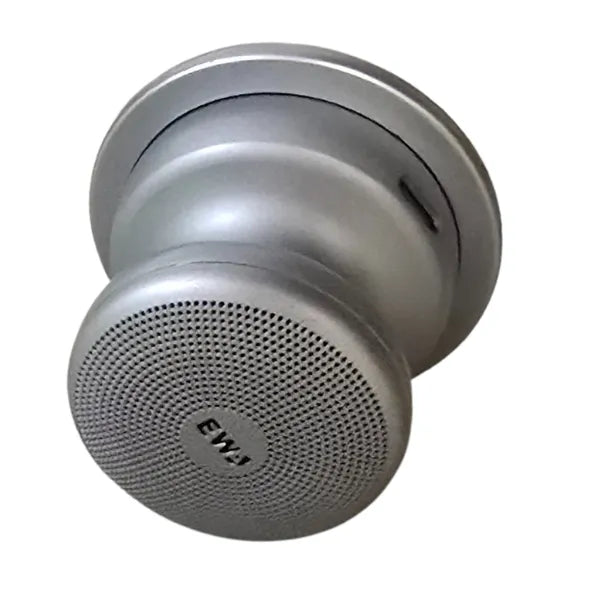 Enceinte compacte magnétique étanche avec aimant intègre idéale pour usage quotidien.